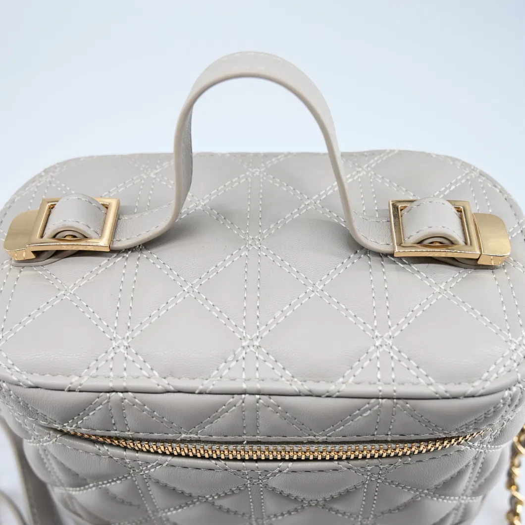 Chic Gray Mini Backpack for Women: Featuring a Distinctive Round Design