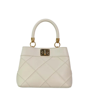 Stylish Beige Handbag with Gold Details for Modern Women