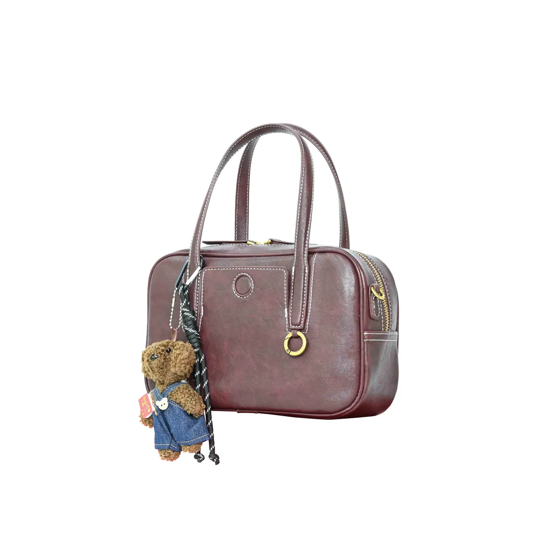 Fashionable Dark Brown PU Leather Handbag a Trendy Choice with a Shoulder Strap and Crossbody Design Showcasing Individual Charm