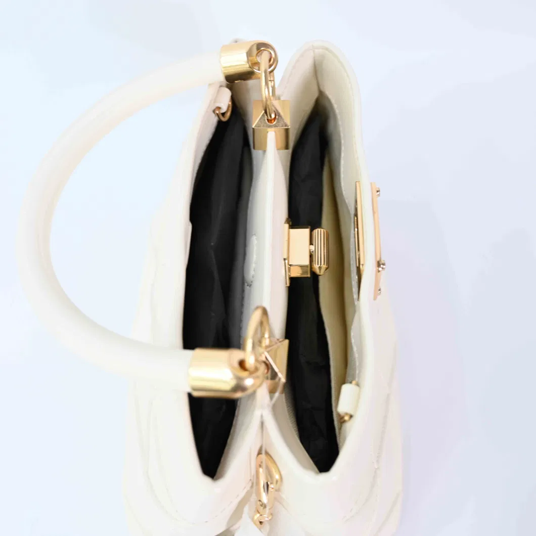 Gilded Glamour: Chic Beige Handbag with Golden Accents