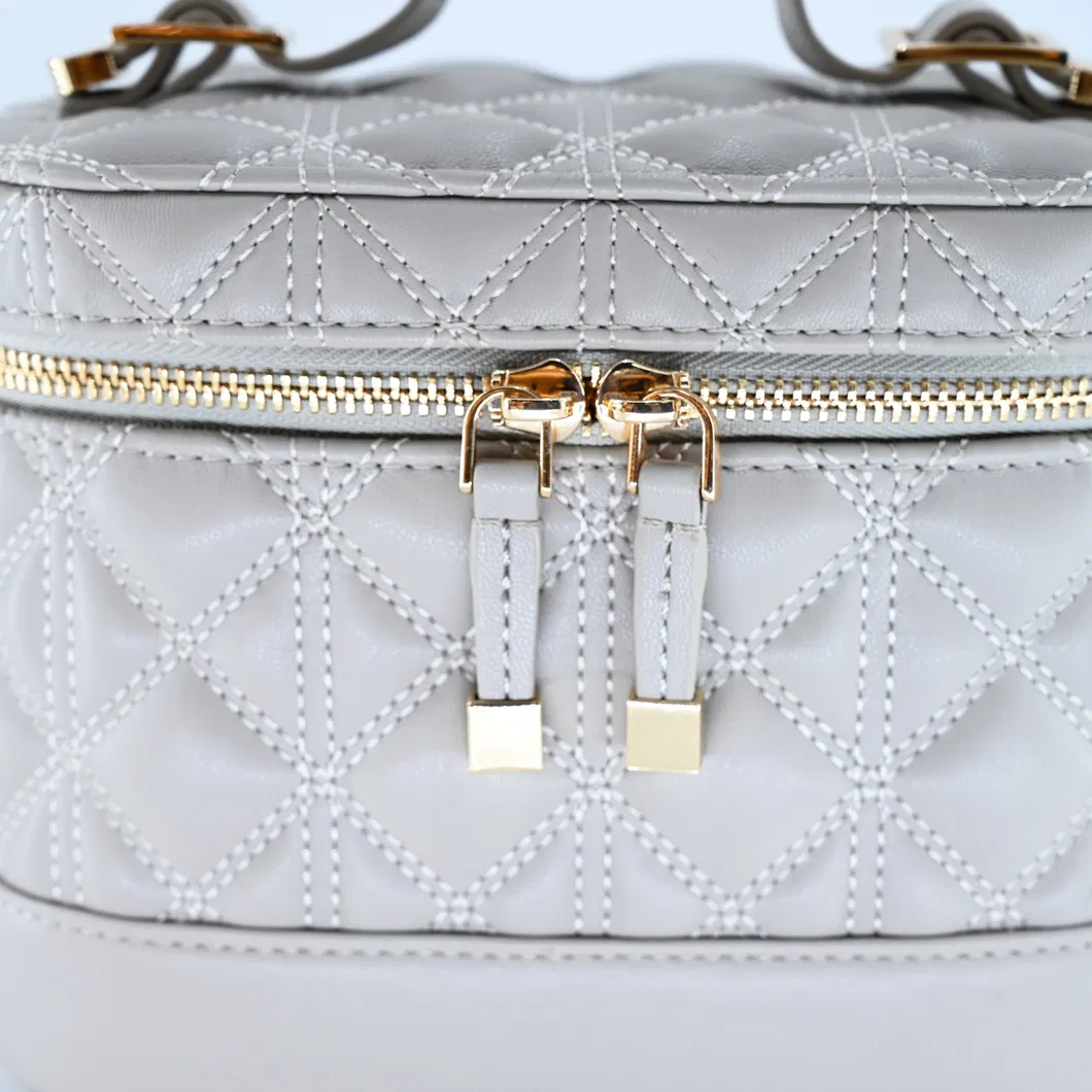 Chic Gray Mini Backpack for Women: Featuring a Distinctive Round Design
