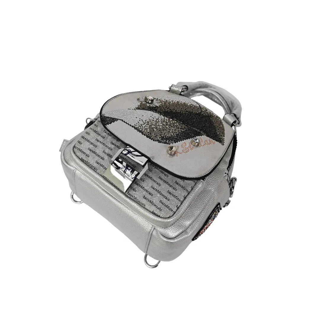 Sleek Silver Mini Backpack with Glossy Finish for Travel