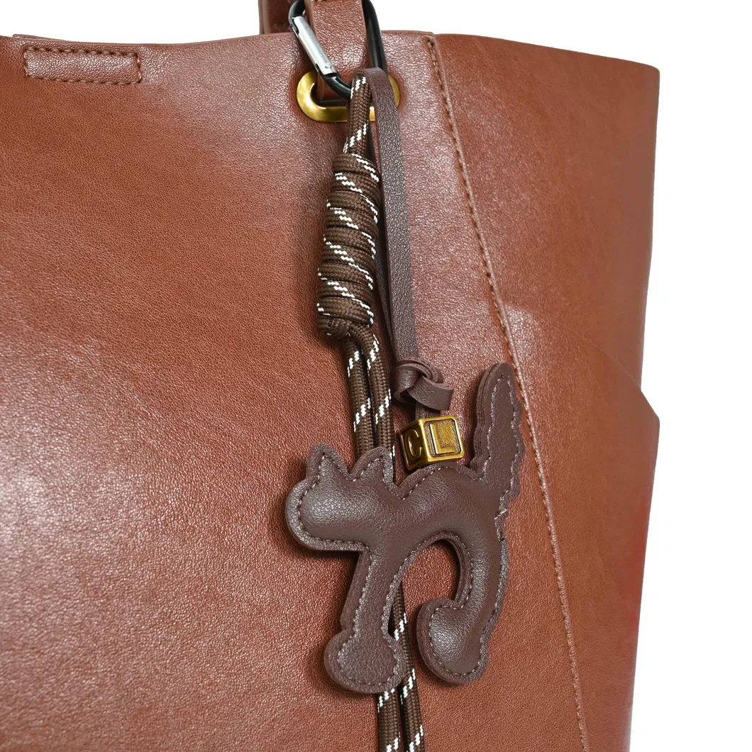 Designer Leather Underarm Bag - a Stylish and Dainty Handbag for Young Ladies