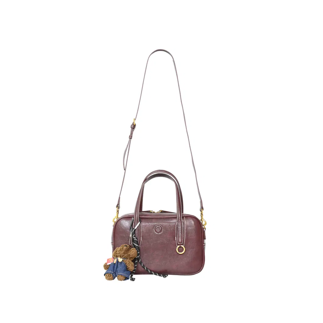 Fashionable Dark Brown PU Leather Handbag a Trendy Choice with a Shoulder Strap and Crossbody Design Showcasing Individual Charm