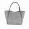 Stylish Gray Handbag for Women Featuring a Distinctive Textured Design