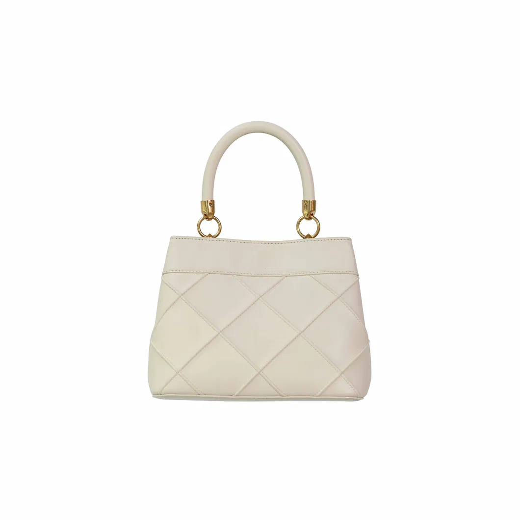 Stylish Beige Women&prime;s Handbag with Eye-Catching Gold Elements
