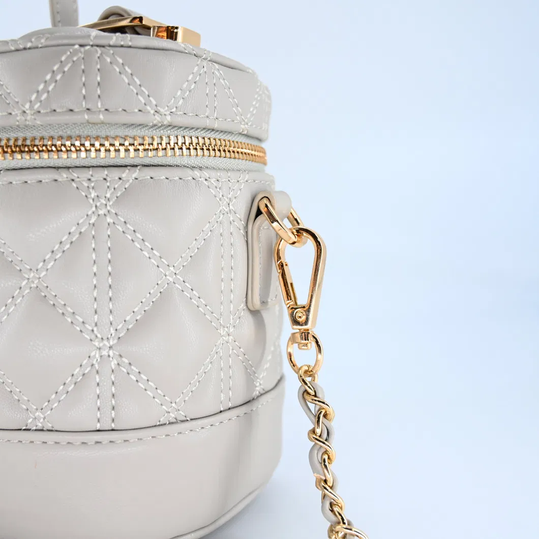 Chic Gray Mini Backpack for Women: Featuring a Distinctive Round Design