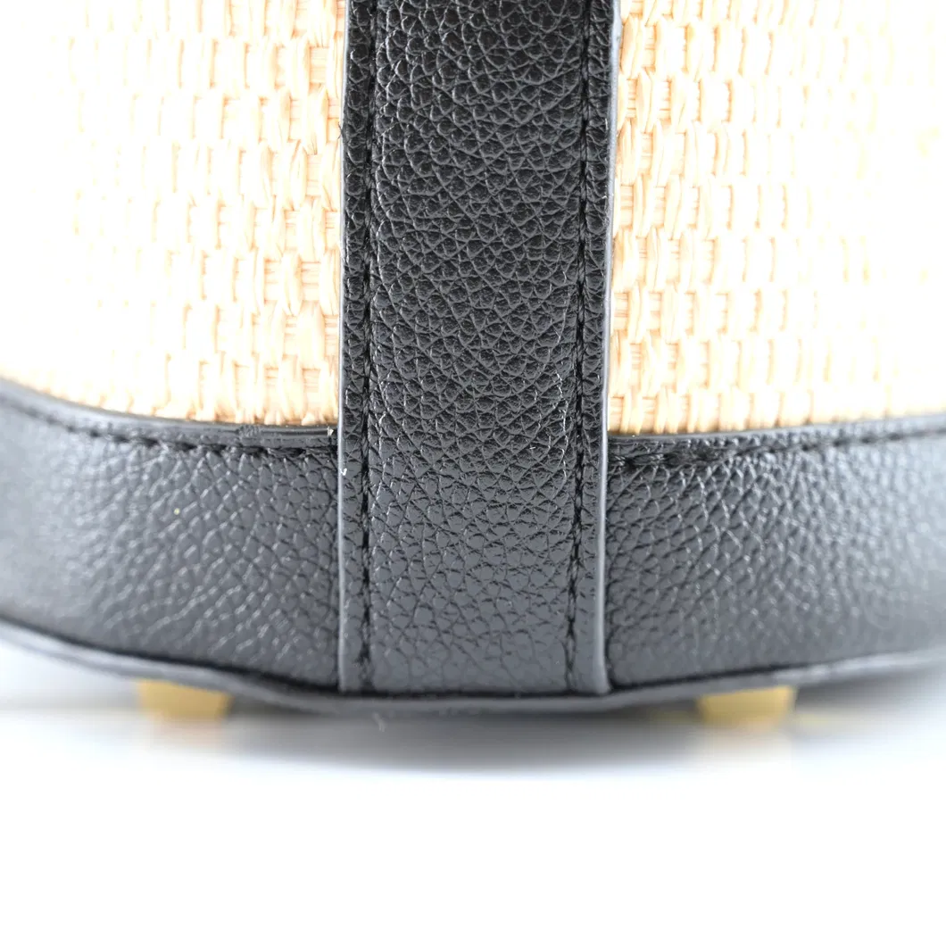 Sleek Minimalist Bucket Bag: Black &amp; Brown Colorblock for Modern Women