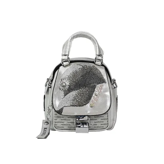 Glossy Silver Mini Backpack: Sleek and Stylish for Travel Enthusiasts