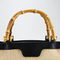 Chic Women′s Handcrafted Woven Handbag with Unique Bamboo Handle