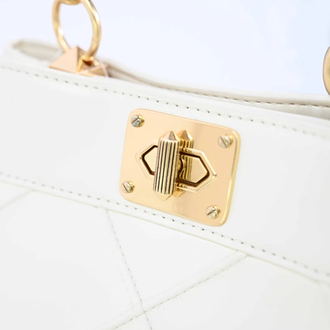 Stylish Beige Women&prime;s Handbag with Eye-Catching Gold Elements