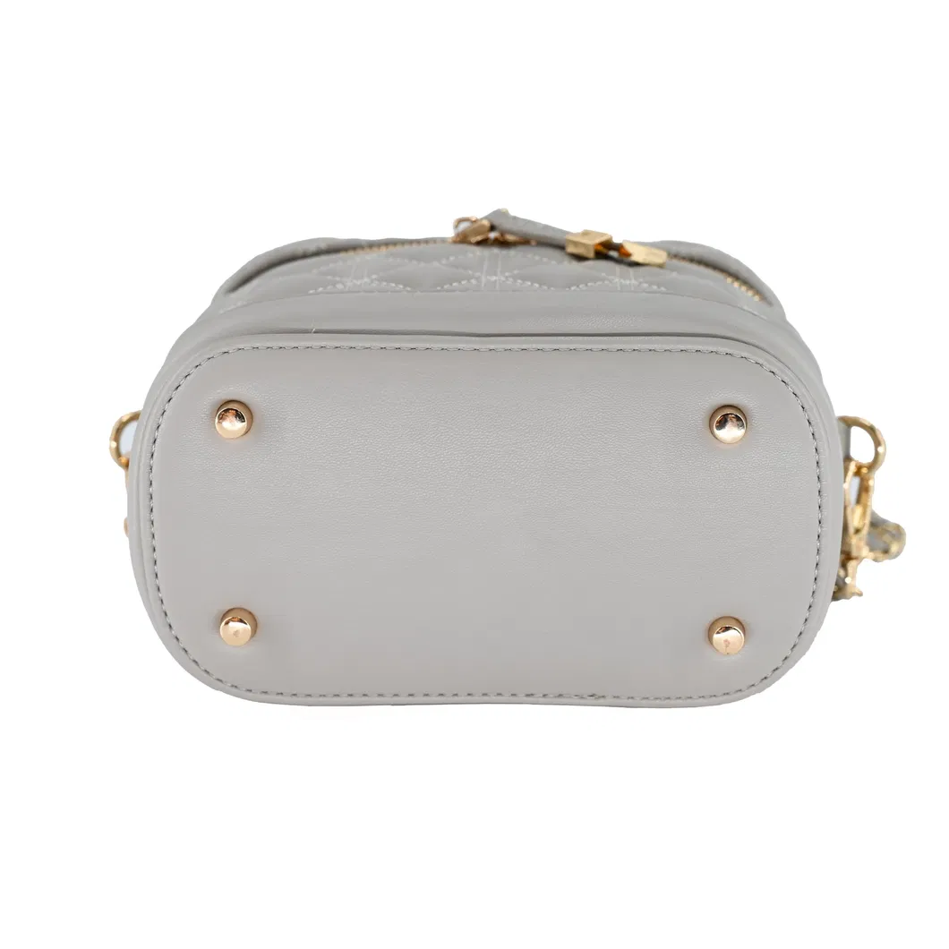 Chic Gray Mini Backpack for Women: Featuring a Distinctive Round Design