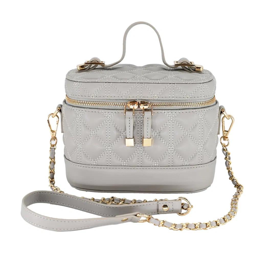 Chic Gray Mini Backpack for Women: Featuring a Distinctive Round Design