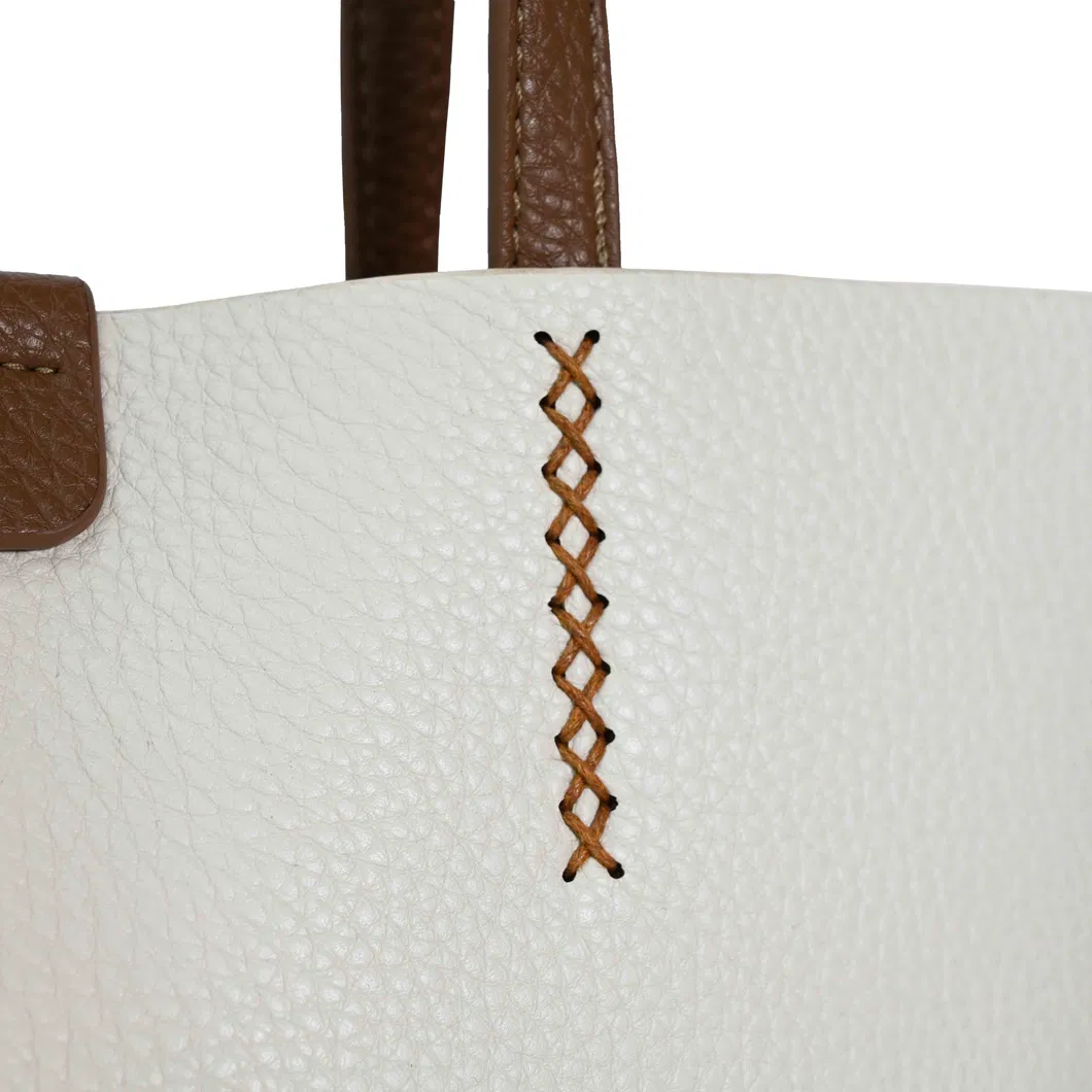 a Stylish and Minimalist Designer Leather Underarm Handbag with a Silk Scarf Braided Flower Design