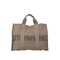 Sophisticated Brown Canvas Tote Bag with Subtle Lettering Design