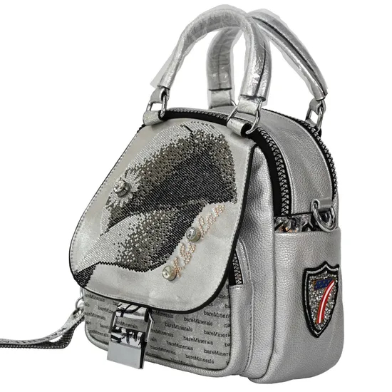 Sleek Silver Mini Backpack with Glossy Finish for Travel